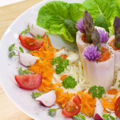 Radish towers with asparagus and chives blossoms