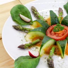 Cucumber blossom with asparagus tips on pineapple cream