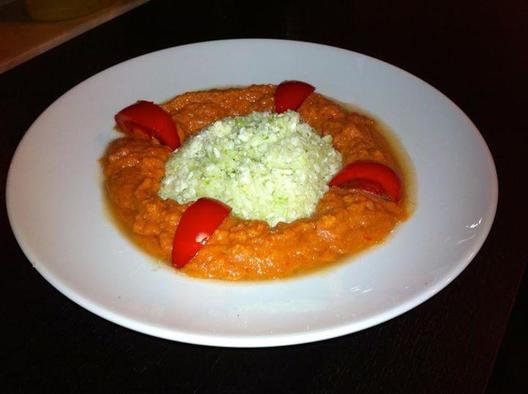 Cauliflower "rice" with a tomato, carrot, avocado, fennel sauce
