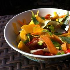 Corn salad, butternut, radish, carrot, zuchini with avocado and tomatoes massaged in
