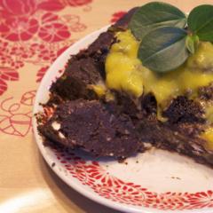 Raw vegan brownies with chocolate sauce Raw vegan brownies with chocolate sauce