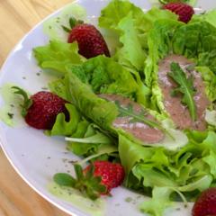 Banana - strawberry on leafy greens