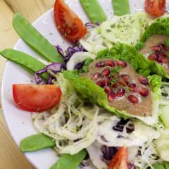 Pomegranate and banana on cabbage Pomegranate and banana on cabbage