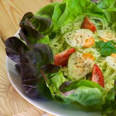 Pineapple - parsley - "pasta" on leafy greens Pineapple - parsley - "pasta" on leafy greens
