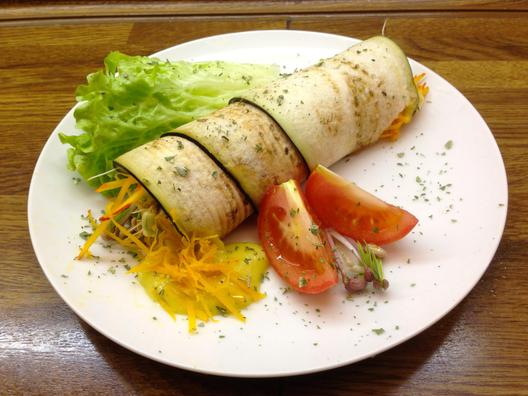 Eggplant - rolls with grated pumpkin and orange - sauce