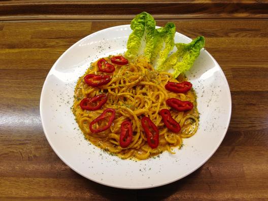 Radish - "pasta" with kiwi - orange - sauce