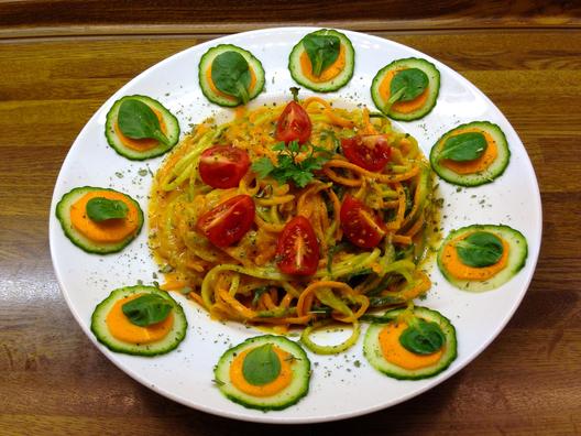 Cucumber - carrot - noodles with orange - date - sauce