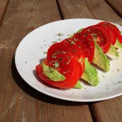 Simple tomato and avocado slices with some lemon juice and Italian herbs...