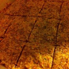 Some carrot, tomato, flax seeds crackers waiting in the dehydrator to get crunchy.