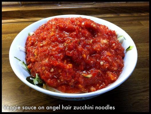 Veggie sauce on angel hair zucchini noodles - sauce was red pepper, tomato, carrot, hazelnut, zucchini