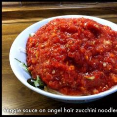Veggie sauce on angel hair zucchini noodles - sauce was red pepper, tomato, carrot, hazelnut, zucchini