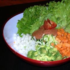 Zucchini, radish, carrots, avocado, lettuce salad with tomato & celery sauce